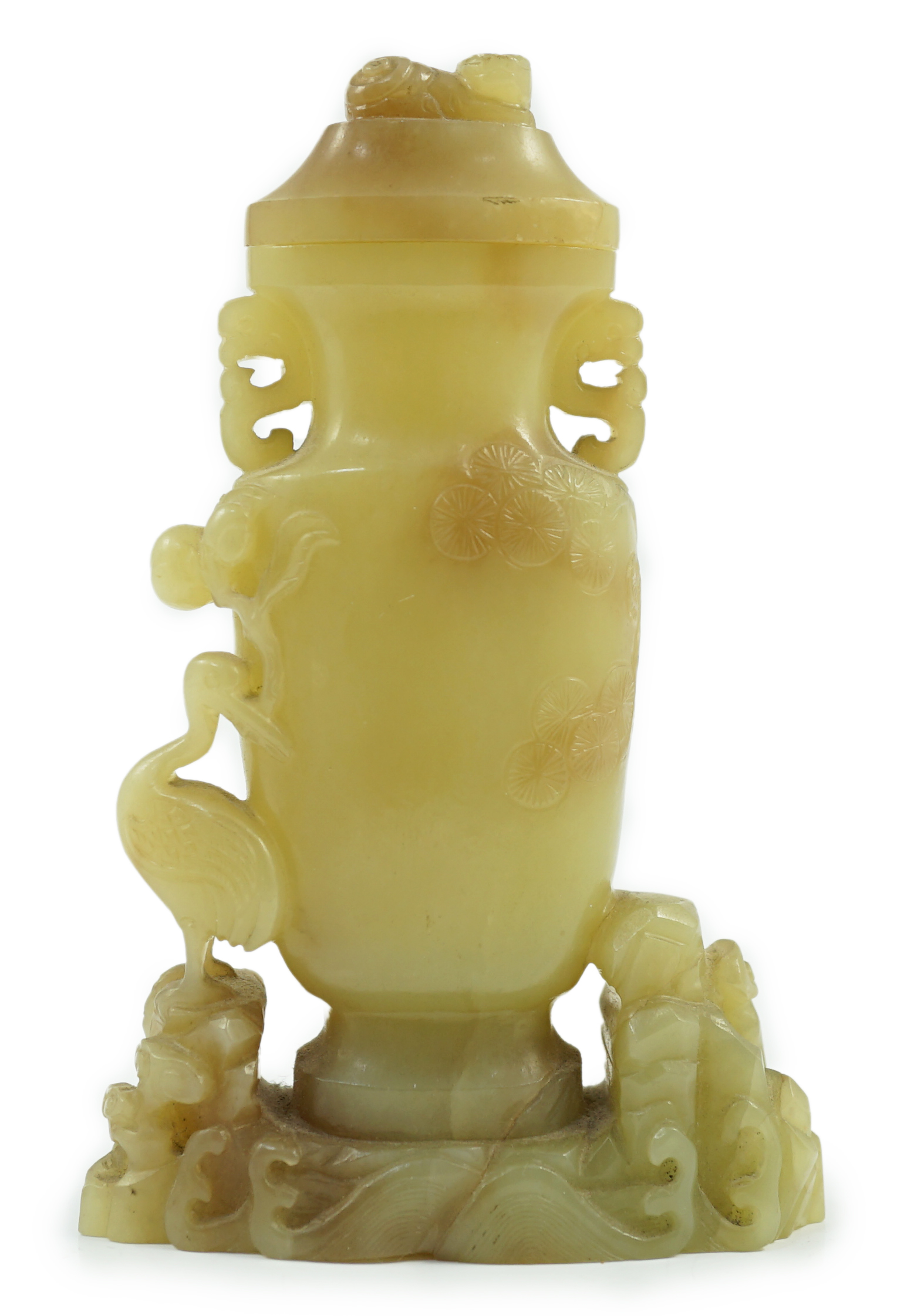 A Chinese yellow and russet jade vase and cover, 19th/20th century